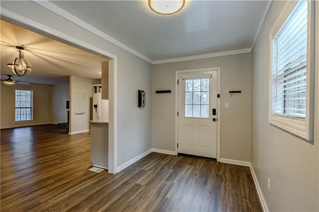 a view of hallway with shower