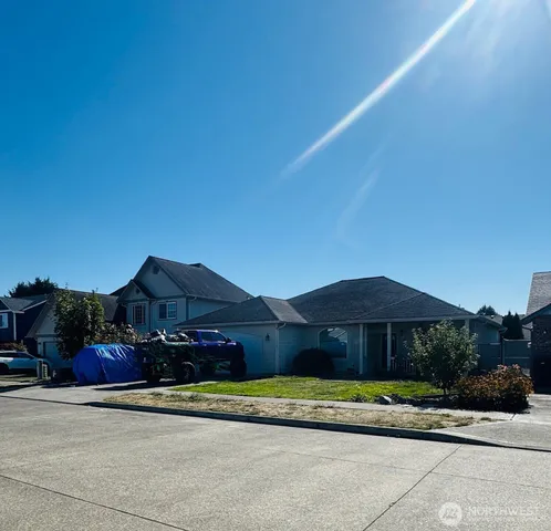 a house view with a garden space