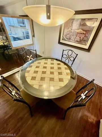 a kitchen with stainless steel appliances a stove and a microwave