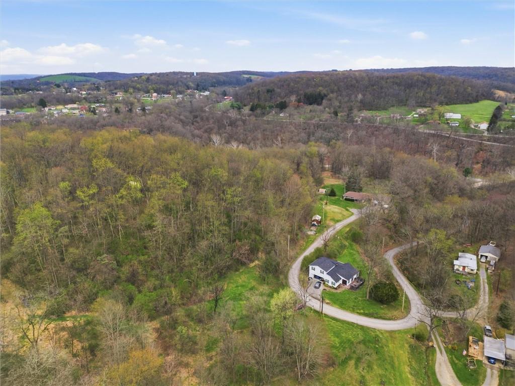 0 Romigh Road Freedom, PA 15042 - Photo 14 of 23 an aerial view of a house with yard swimming pool and mountain view