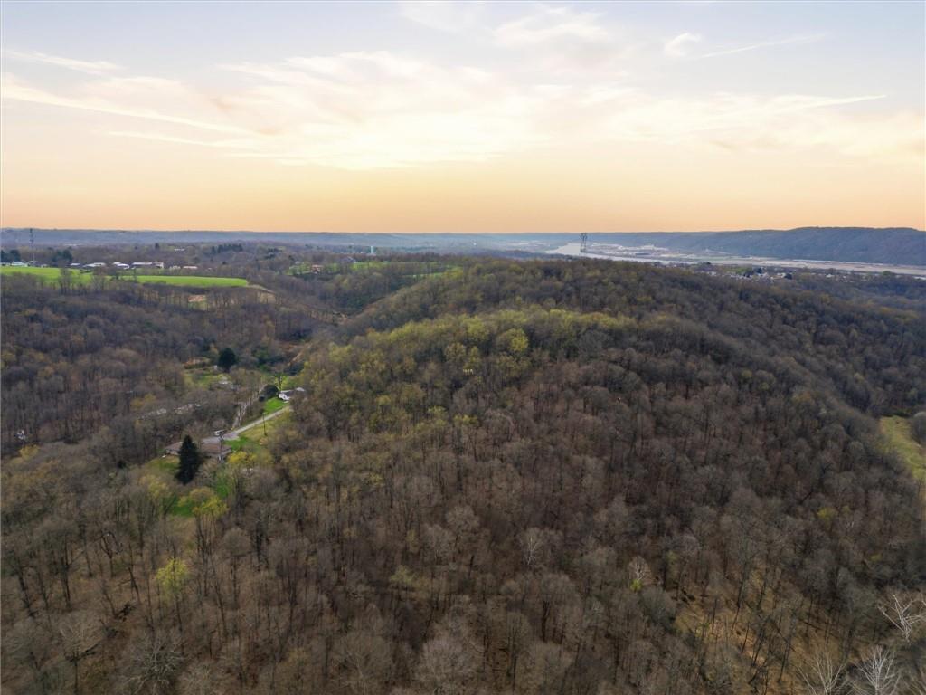 0 Romigh Road Freedom, PA 15042 - Photo 20 of 23 a view of a city with lush green forest