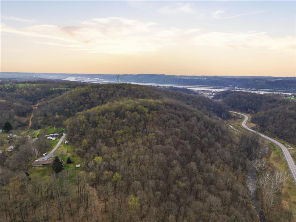 0 Romigh Road Freedom, PA 15042 - Photo 21 of 23 a view of a city with lush green forest