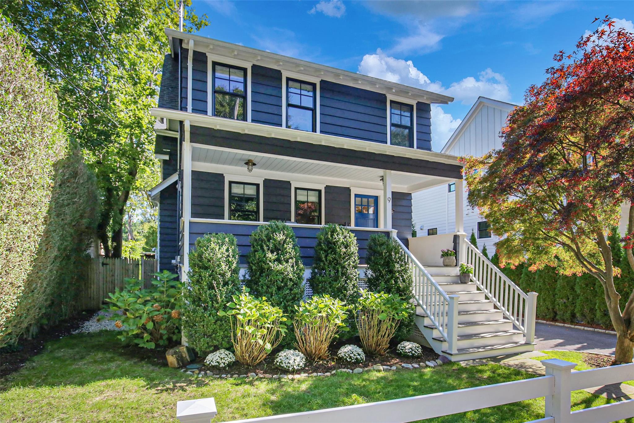 9 Grapal Street Rye, NY 10580 - Photo 1 of 1 a front view of a house with a yard