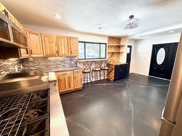 a bedroom with a bed and a walk in closet