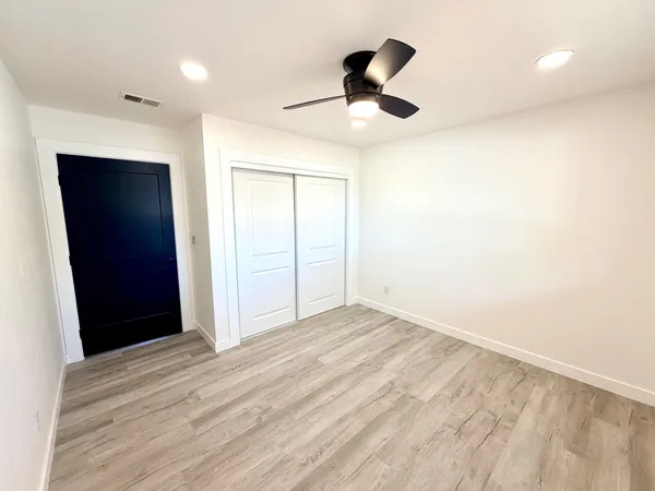 a view of a backyard of the house