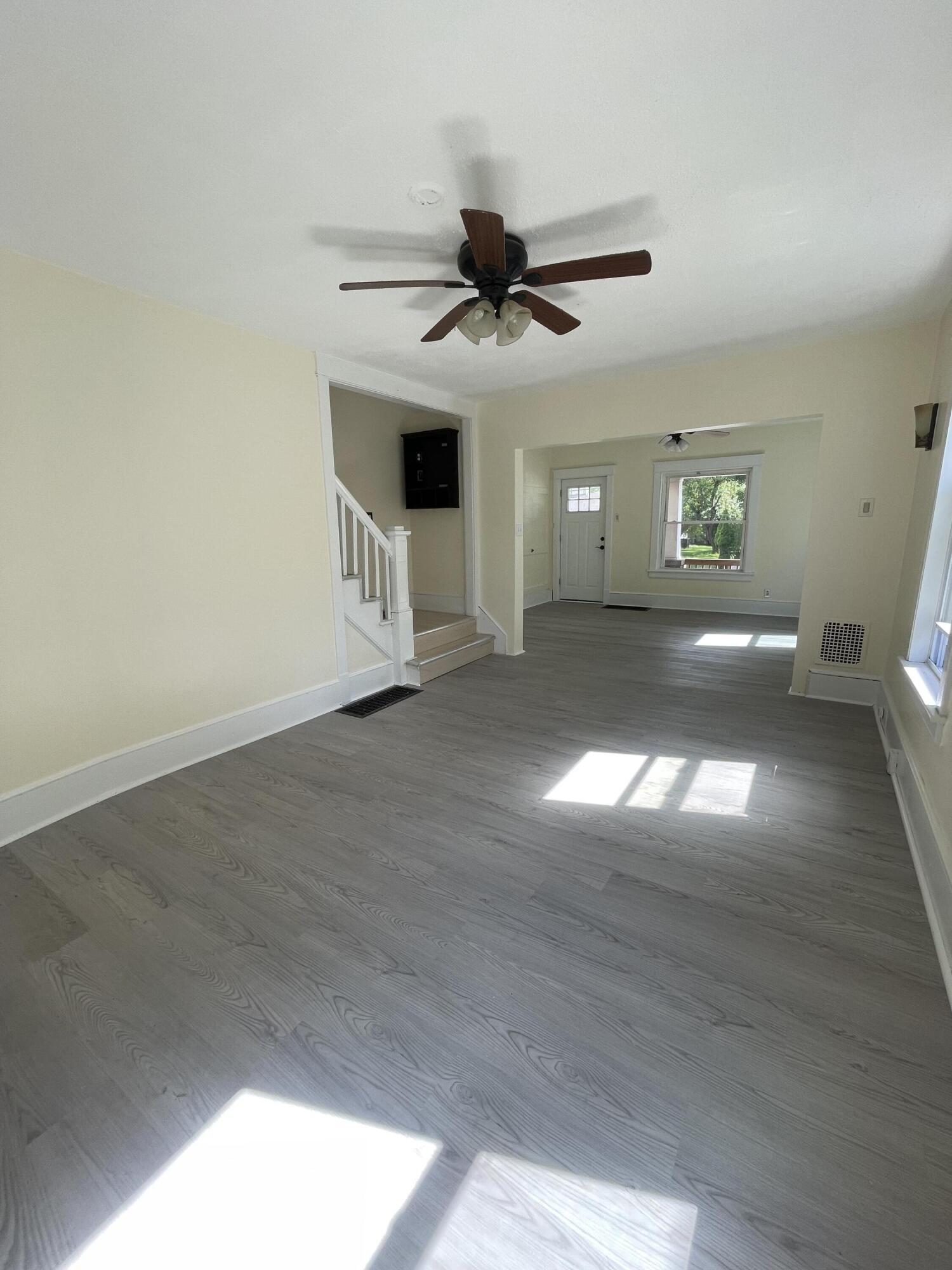 1664 West Main Street Stroudsburg, PA 18360 - Photo 13 of 29 a view of empty room with wooden floor and fan