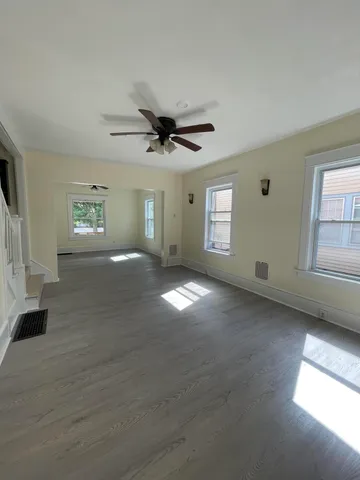 an empty room with windows