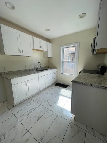 a view of a livingroom with a fireplace