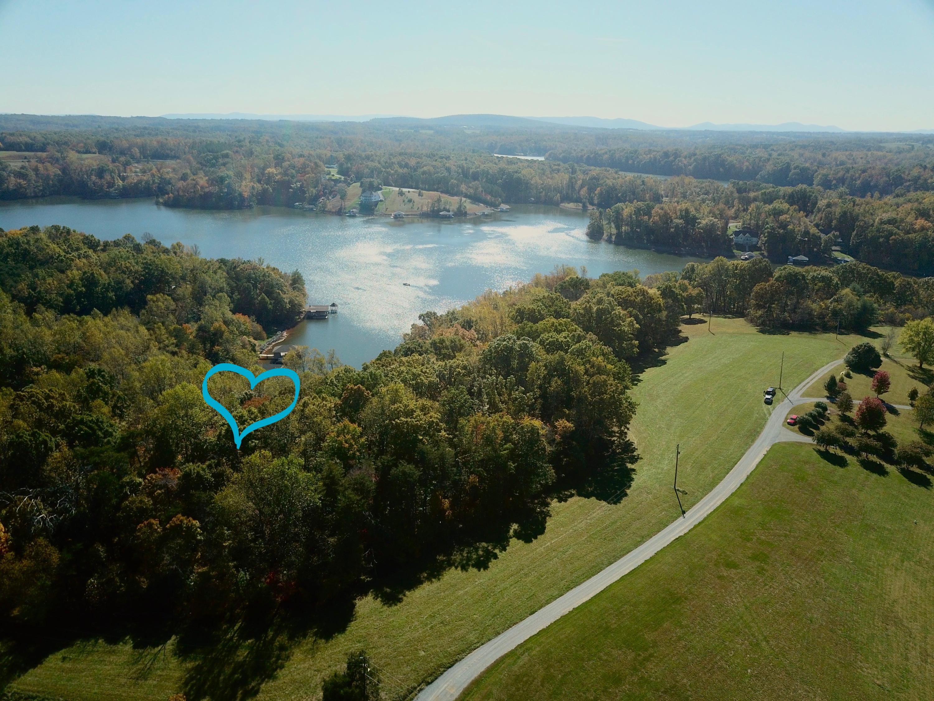 0 Three 3 Quarter Point Road Wirtz, VA 24184 - Photo 28 of 33 an aerial view of a golf course with chairs