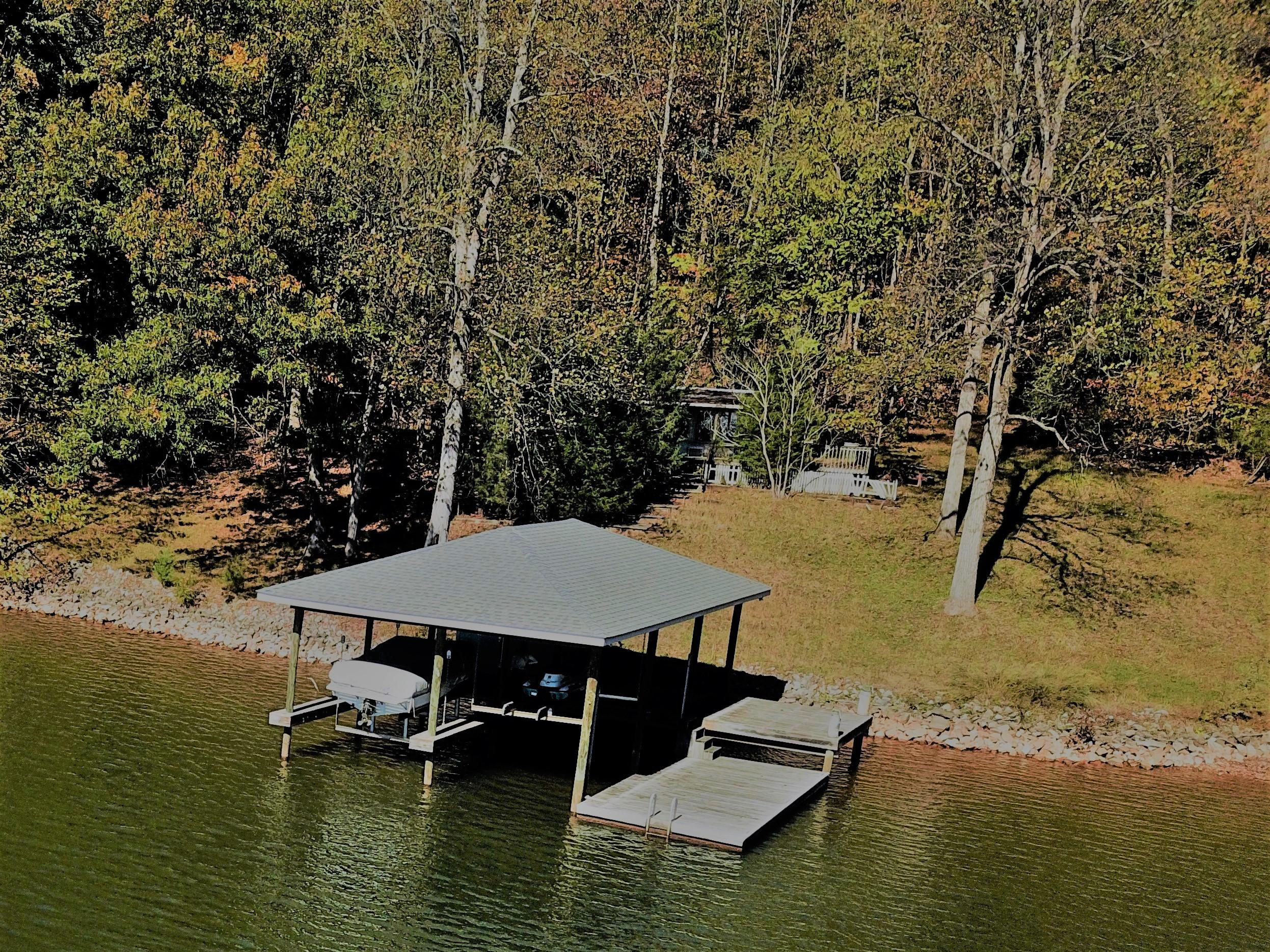 0 Three 3 Quarter Point Road Wirtz, VA 24184 - Photo 8 of 33 a view of a lake with furniture