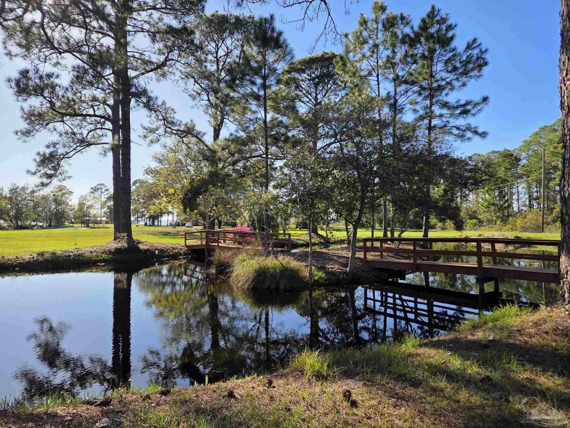 1164 Pearson Road, Unit LOT 2 Milton, FL 32583 - Photo 12 of 25 a view of swimming pool and sitting area