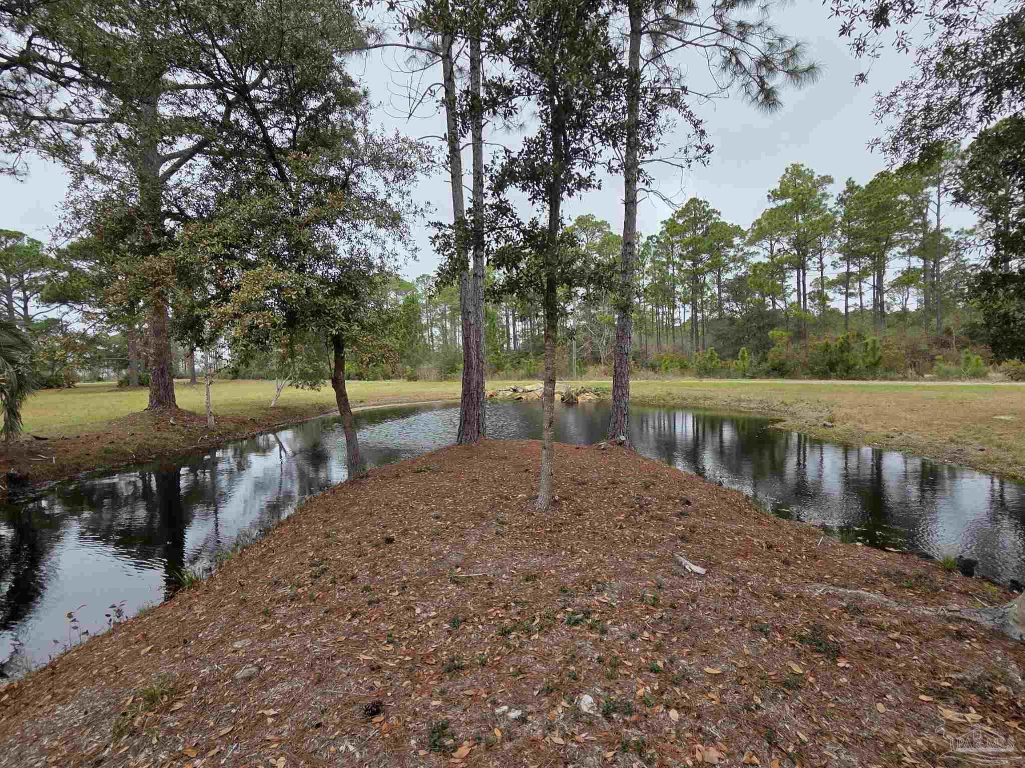 1164 Pearson Road, Unit LOT 2 Milton, FL 32583 - Photo 17 of 25 a view of lake