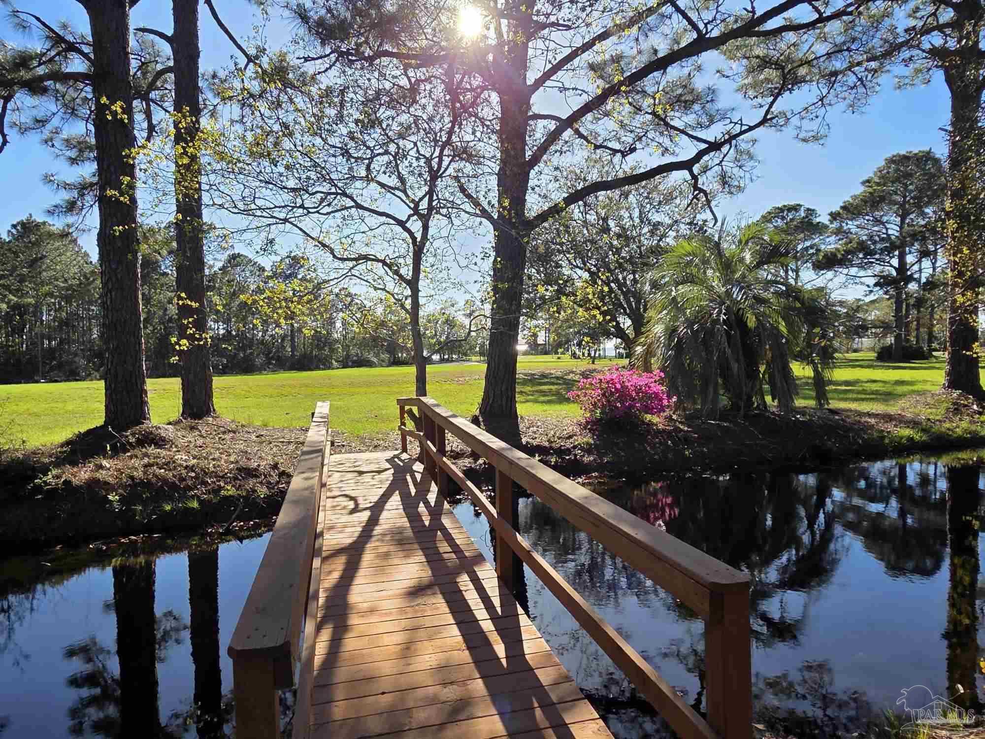 1164 Pearson Road, Unit LOT 2 Milton, FL 32583 - Photo 8 of 25 a view of a swimming pool with a patio and a yard