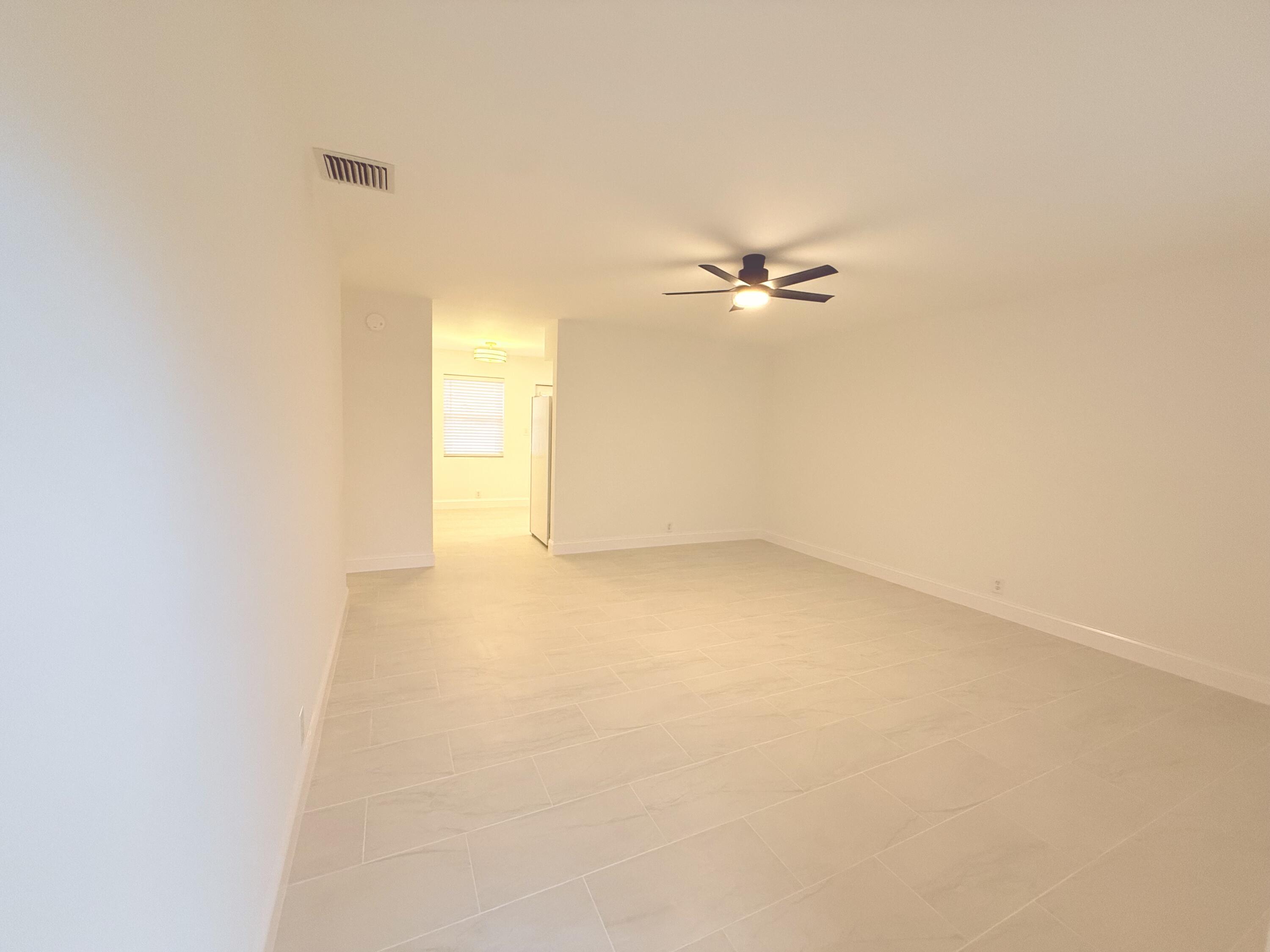 626 Prosperity Farms Road, Unit 7 North Palm Beach, FL 33408 - Photo 3 of 15 IMG_5532-preview