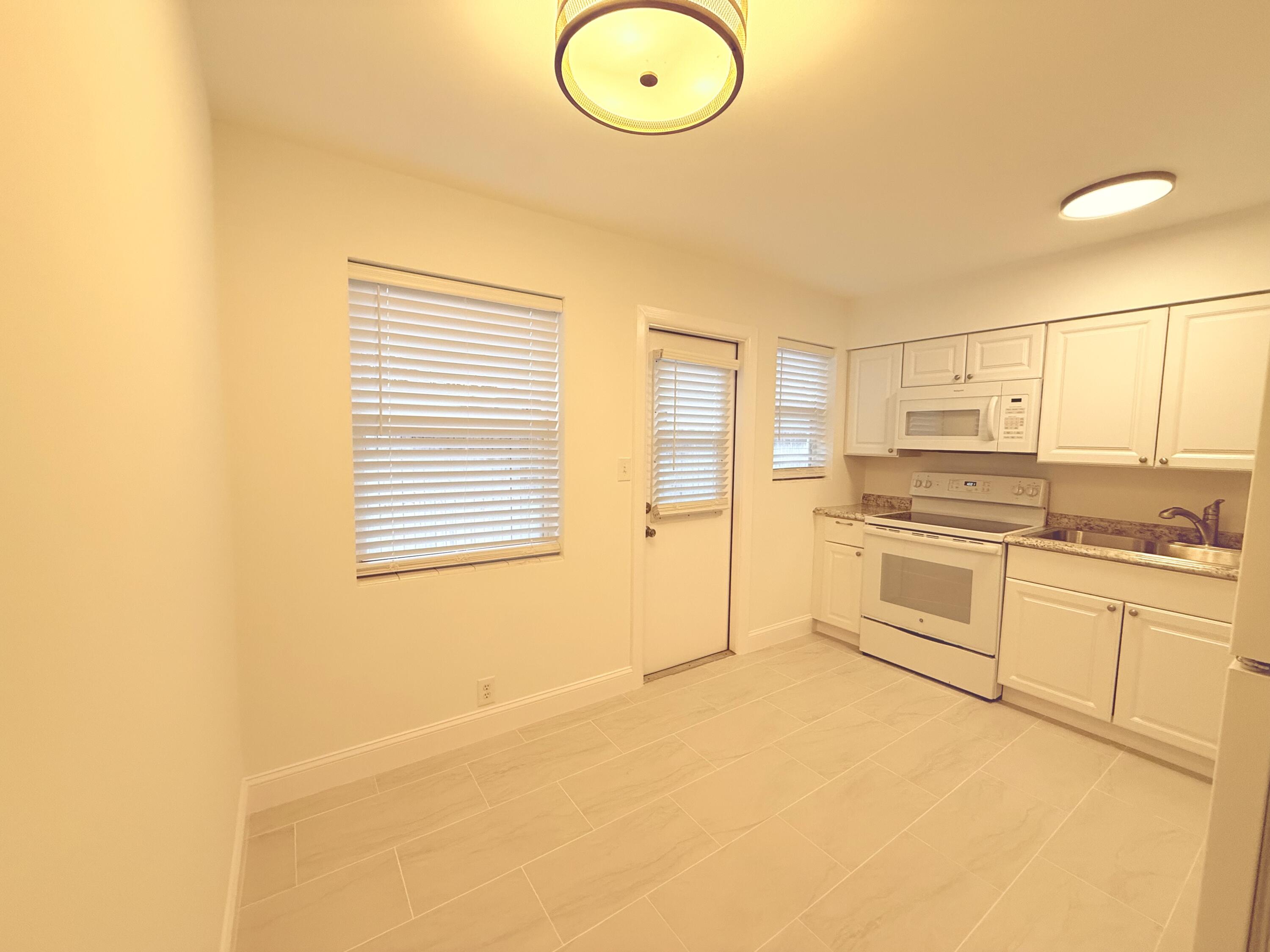 626 Prosperity Farms Road, Unit 7 North Palm Beach, FL 33408 - Photo 6 of 15 IMG_5536-preview