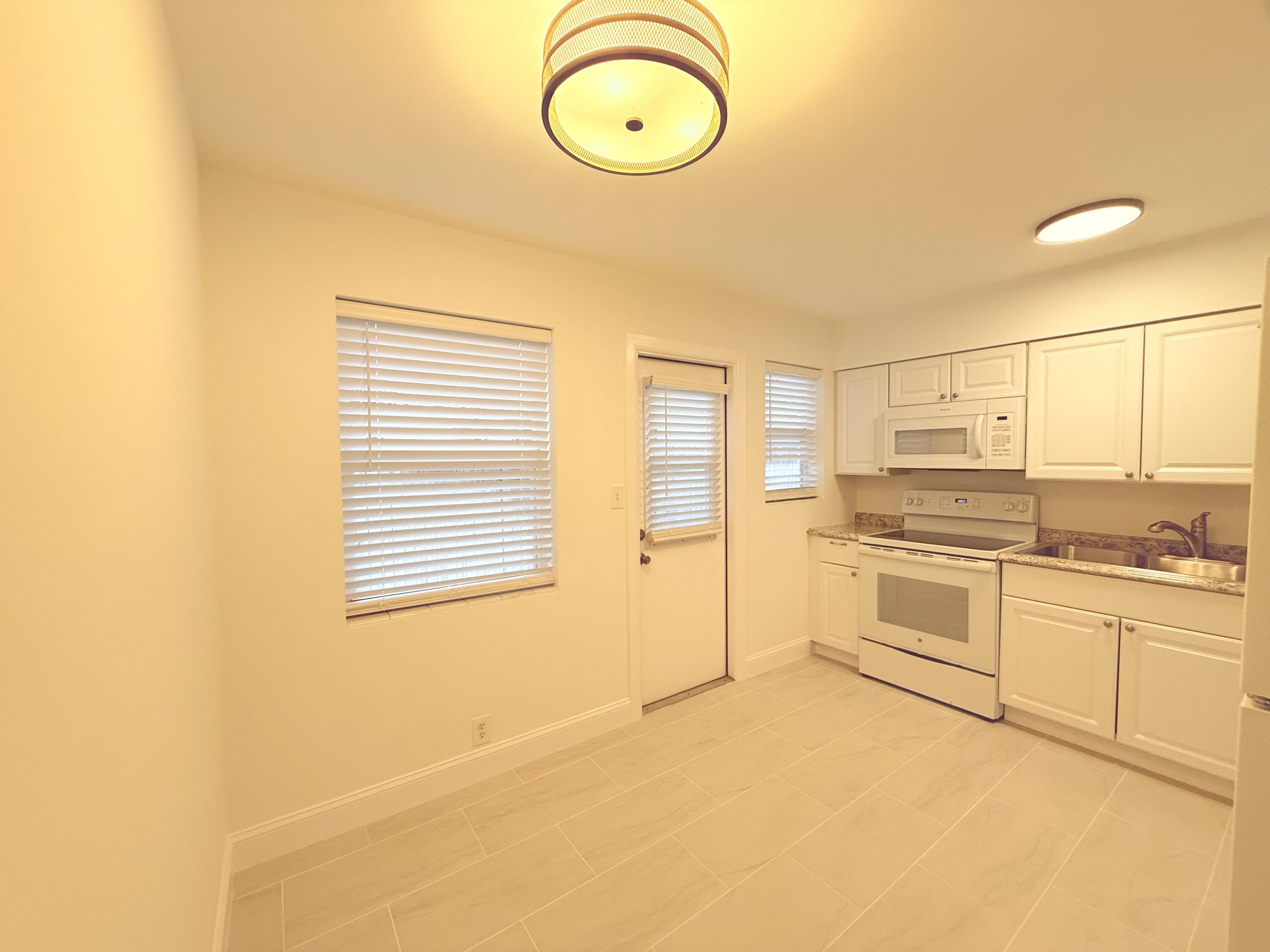 626 Prosperity Farms Road, Unit 7 North Palm Beach, FL 33408 - Photo 7 of 15 IMG_5537-preview