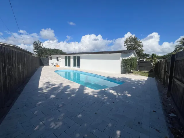 a view of house with outdoor space