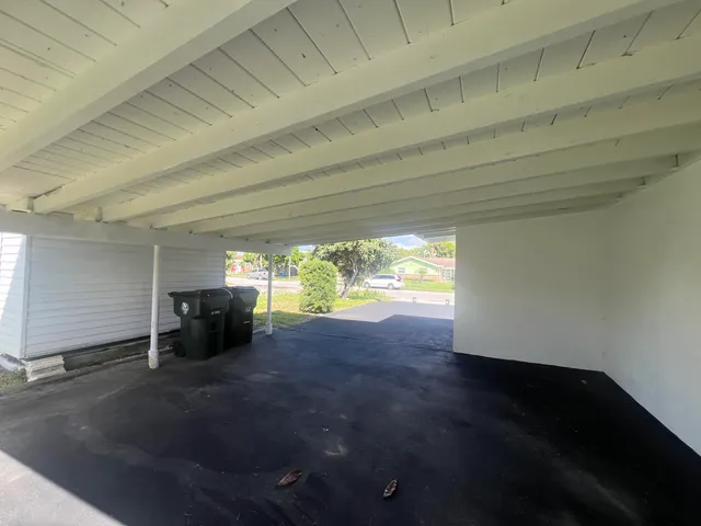 a view of a backyard of the house