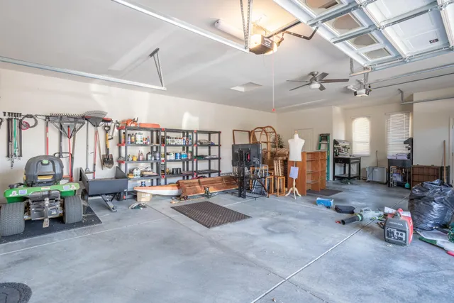a living room with lots of furniture and gym equipment
