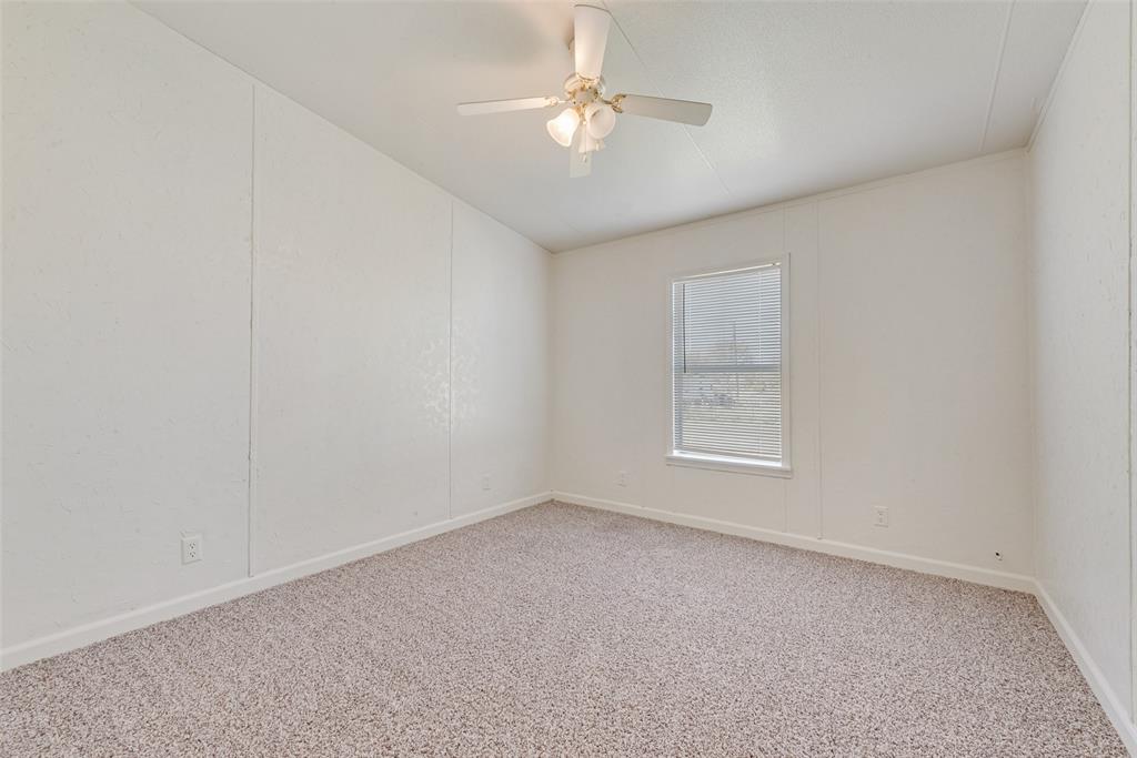 817 Kaufman Street Rosser, TX 75158 - Photo 14 of 29 a view of an empty room with a window