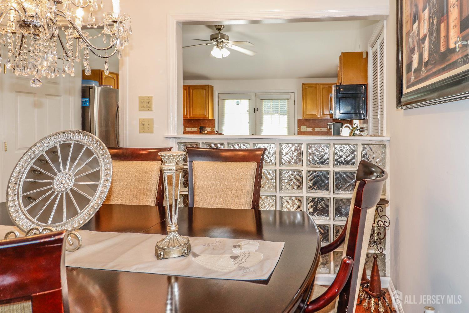 76 Daniel Street Carteret, NJ 07008 - Photo 12 of 37 a view of a dining room with furniture and wooden floor