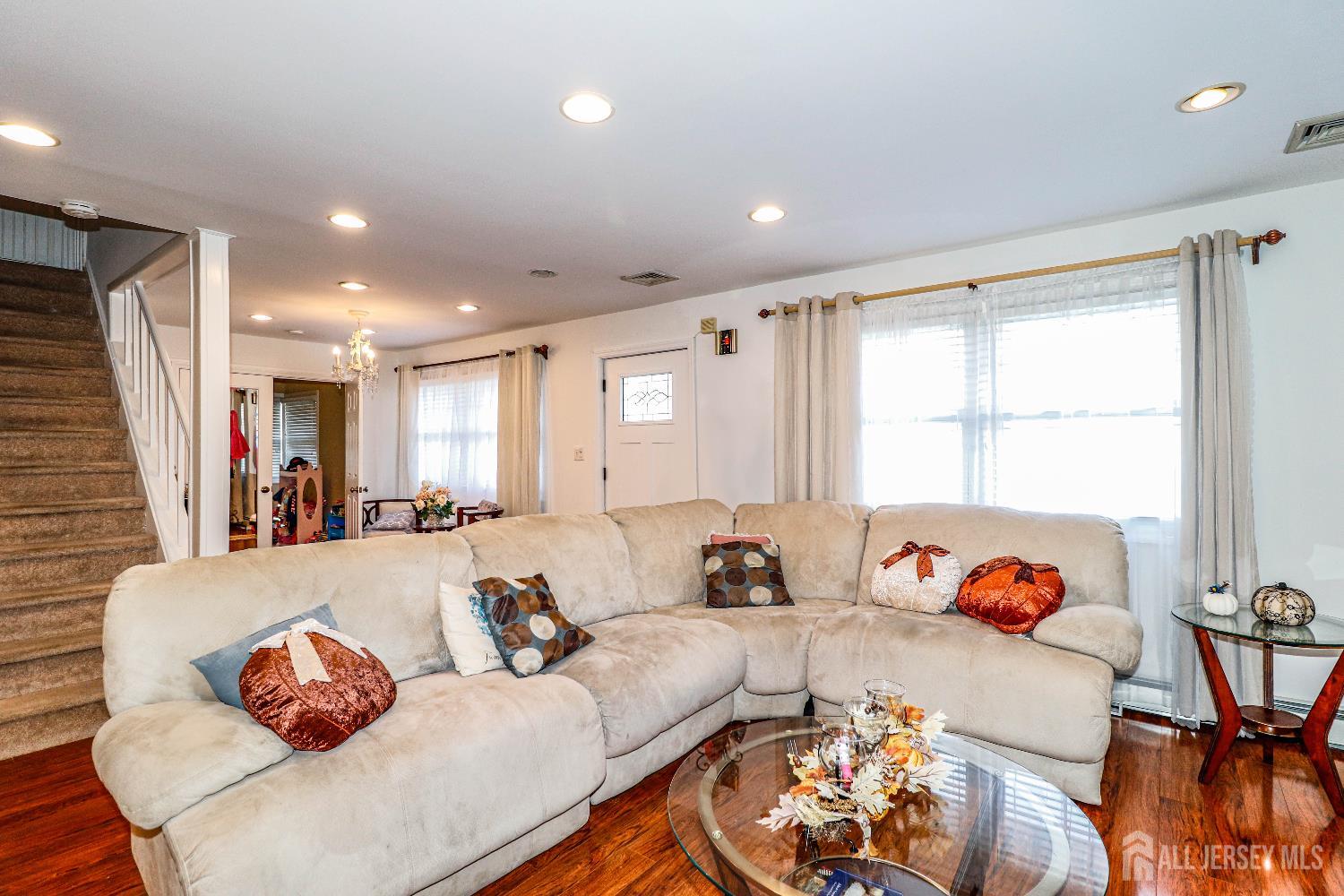 76 Daniel Street Carteret, NJ 07008 - Photo 7 of 37 a living room with furniture and a large window