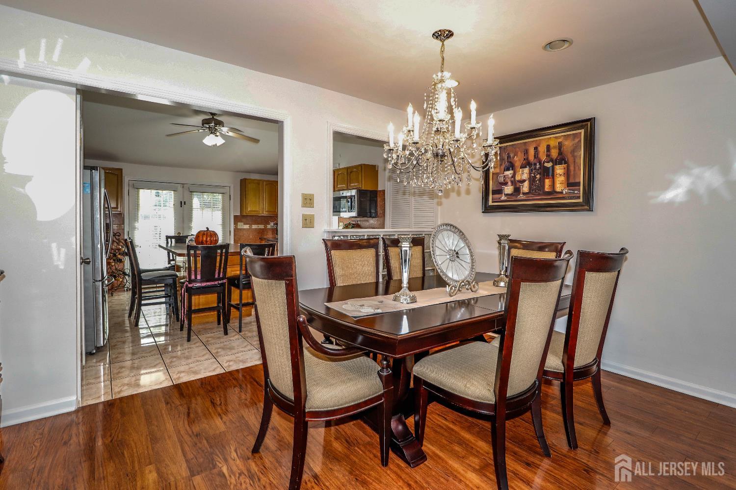 76 Daniel Street Carteret, NJ 07008 - Photo 10 of 37 a view of a dining room with furniture and chandelier