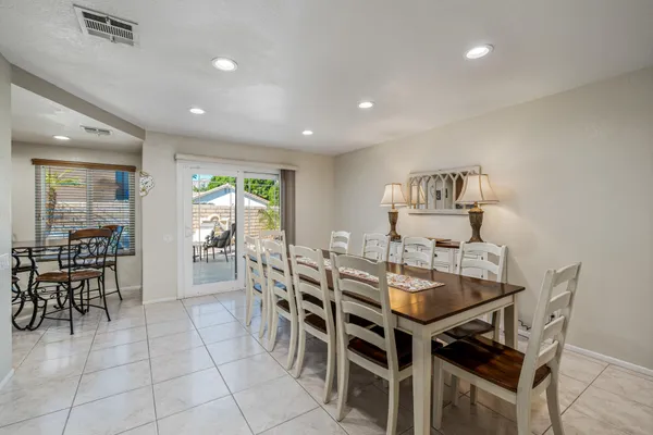 a view of a dining room with furniture