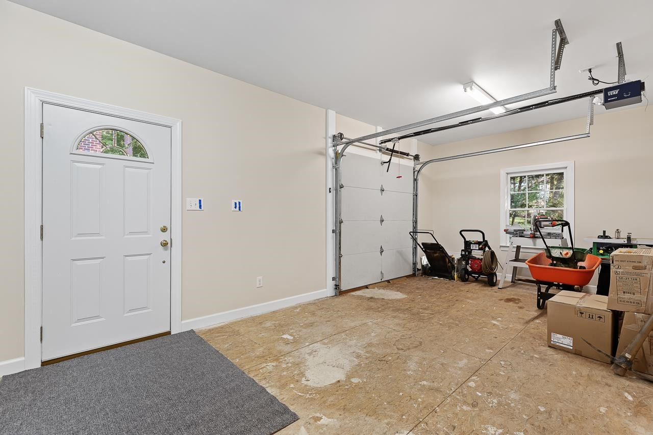 2113 Tibwin Drive Raleigh, NC 27606 - Photo 23 of 30 In addition to the attached garage, there is a detached garage/workshop with a second bonus room above. Detached garage/workshop