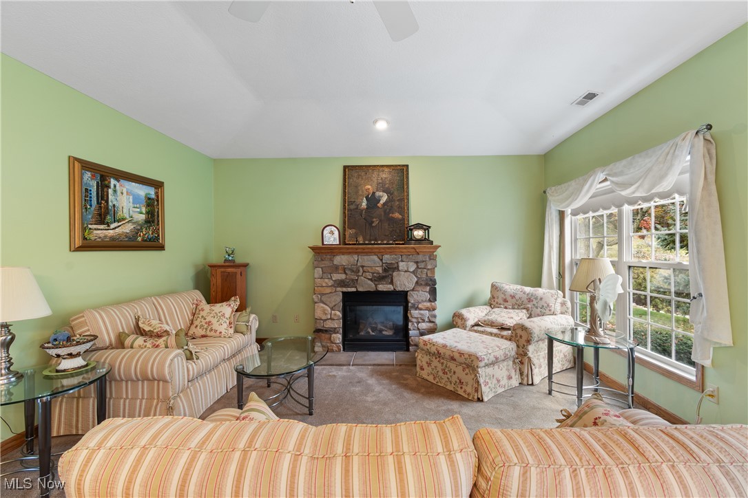 7030 Knight Avenue Northwest Canton, OH 44708 - Photo 5 of 26 Living room featuring a custom stone fireplace