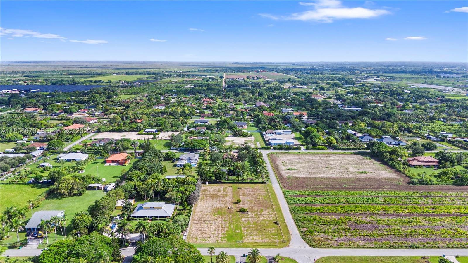 213-xx Southwest 240th Street Homestead, FL 33031 - Photo 11 of 21 an aerial view of residential houses with outdoor space