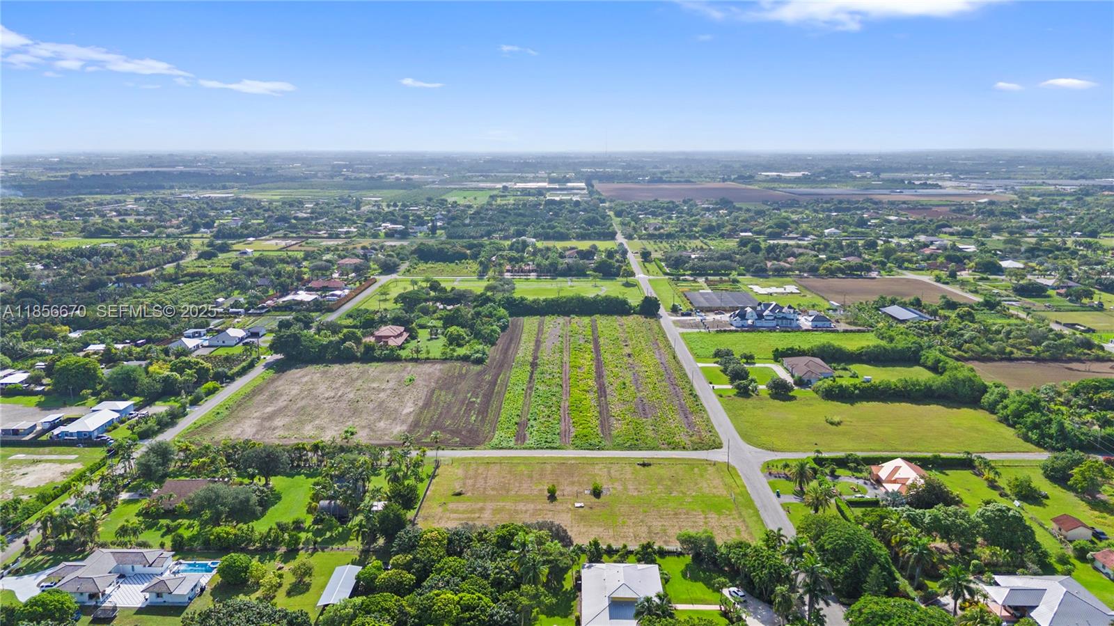 213-xx Southwest 240th Street Homestead, FL 33031 - Photo 9 of 21 an aerial view of a residential houses with city view and lake view