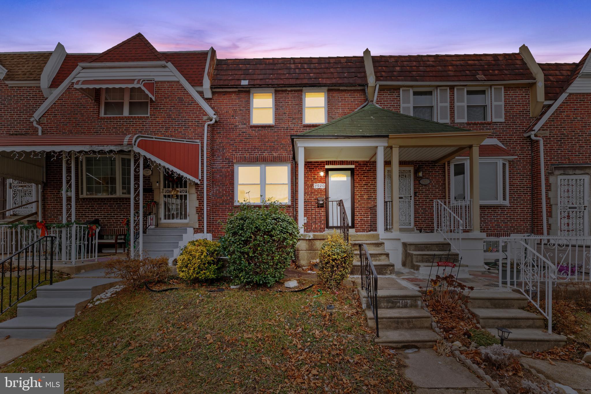 7920 Provident Street Philadelphia, PA 19150 - Photo 5 of 32 a front view of a house with yard and seating space