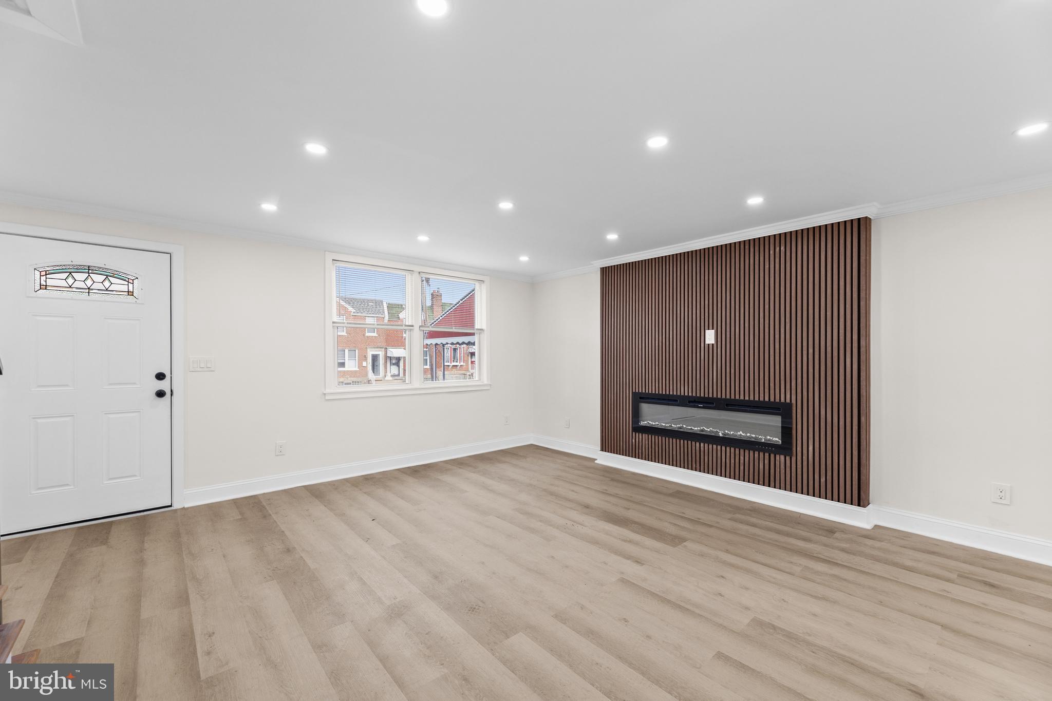 7920 Provident Street Philadelphia, PA 19150 - Photo 7 of 32 a view of an empty room with wooden floor