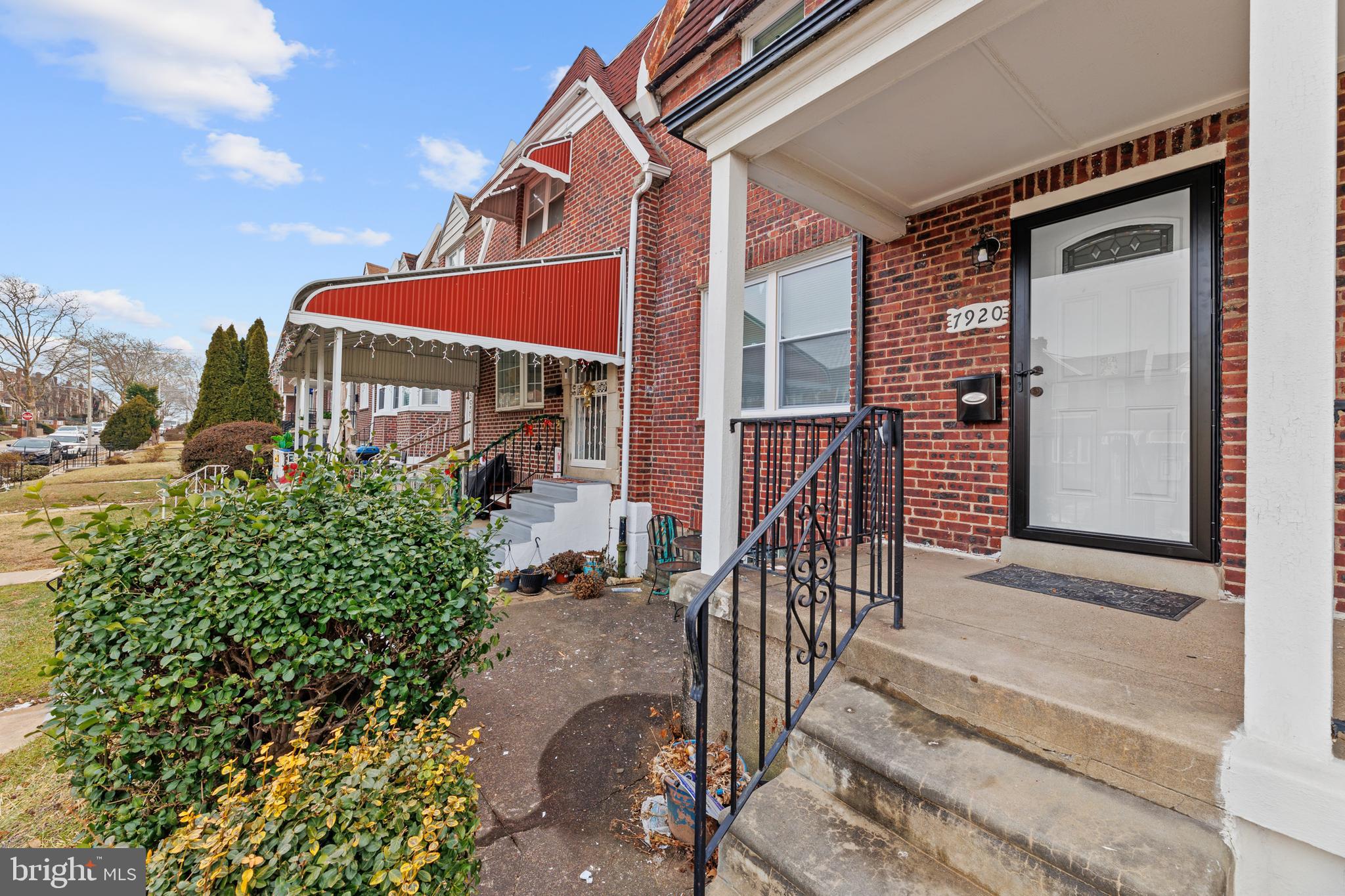 7920 Provident Street Philadelphia, PA 19150 - Photo 8 of 32 a view of a house with backyard and porch