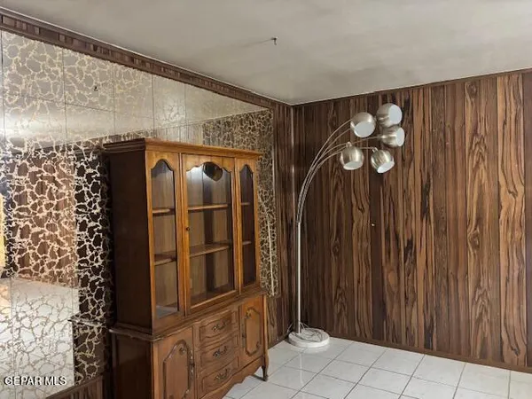 a kitchen with stainless steel appliances granite countertop white cabinets sink and dishwasher