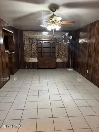 a white refrigerator freezer sitting in a kitchen