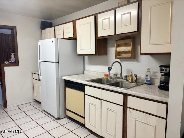 133 Baywood Road El Paso, TX 79915 - Photo 22 of 30 a kitchen with appliances a sink and cabinets