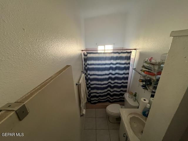 133 Baywood Road El Paso, TX 79915 - Photo 29 of 30 a bathroom with a toilet and shower