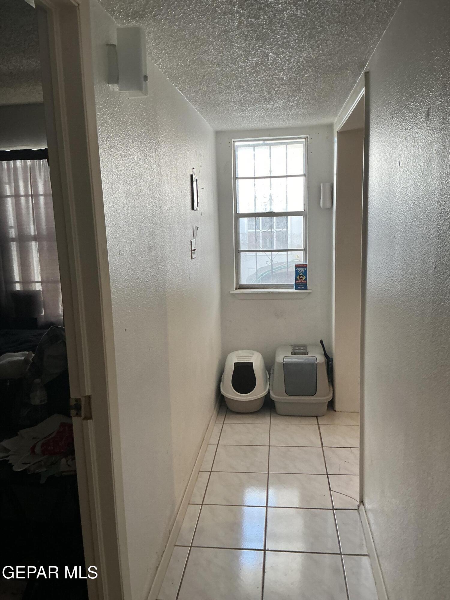 133 Baywood Road El Paso, TX 79915 - Photo 30 of 30 a view of a livingroom with furniture and window
