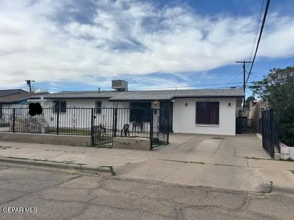 a front view of house with garage