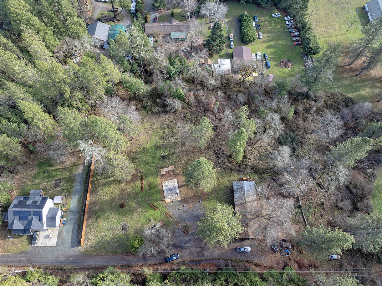 1329 West Evans Creek Road Rogue River, OR 97537 - Photo 22 of 23 an aerial view of a house with a yard