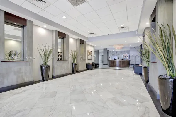 a view of swimming pool with outdoor seating