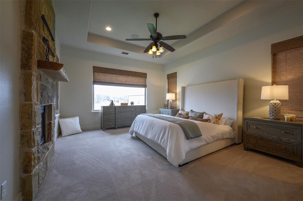 1003 Buckner Road Lipan, TX 76462 - Photo 12 of 31 a spacious bedroom with a large bed and a window