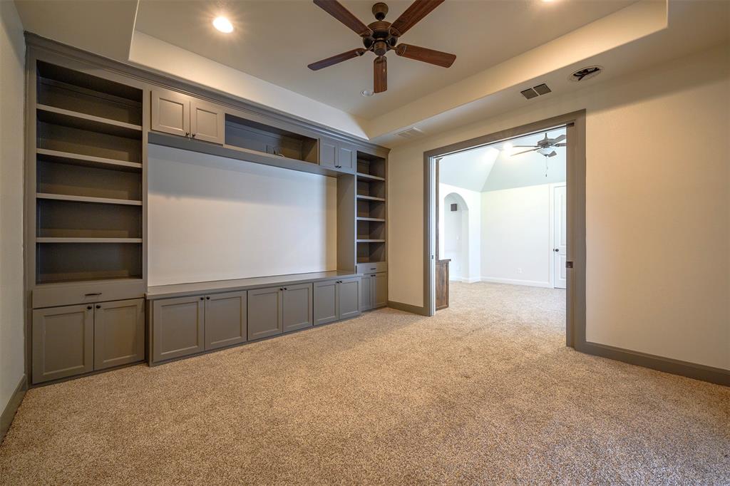 1003 Buckner Road Lipan, TX 76462 - Photo 20 of 31 a view of an empty room with cabinet and a window