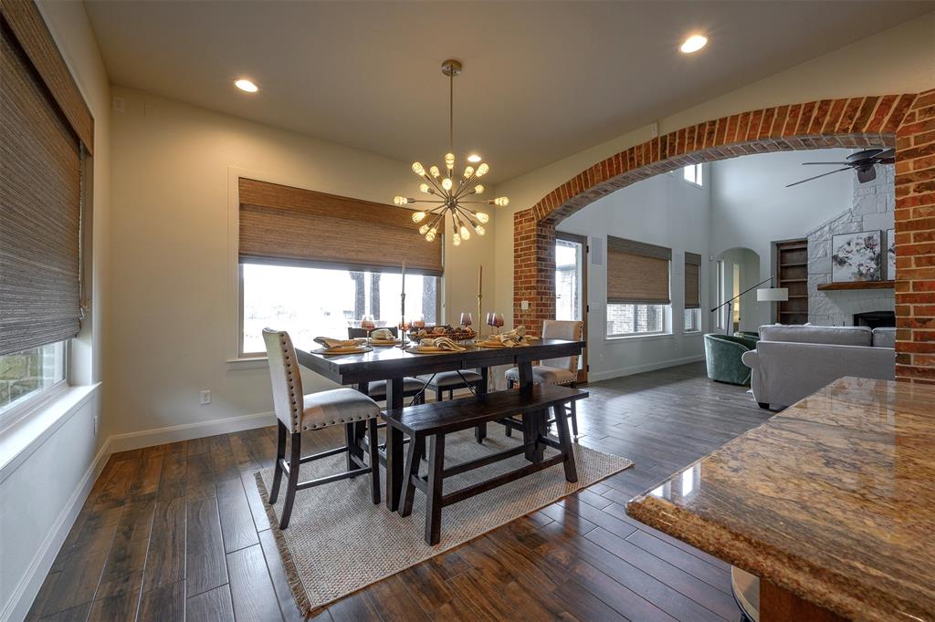 1003 Buckner Road Lipan, TX 76462 - Photo 2 of 31 a view of a dining room with furniture and wooden floor