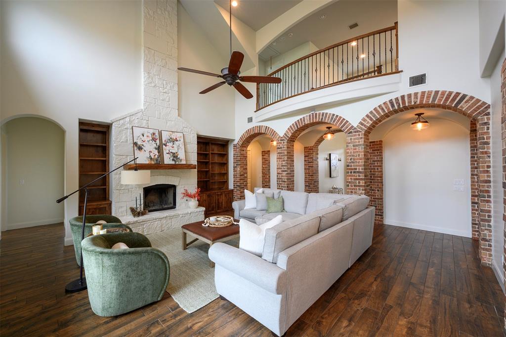 1003 Buckner Road Lipan, TX 76462 - Photo 5 of 31 a living room with furniture and a fireplace