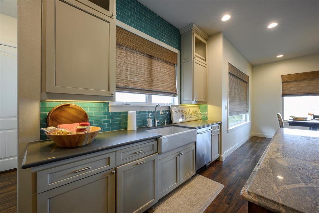 1003 Buckner Road Lipan, TX 76462 - Photo 9 of 31 a kitchen with stainless steel appliances granite countertop a sink a stove and cabinets