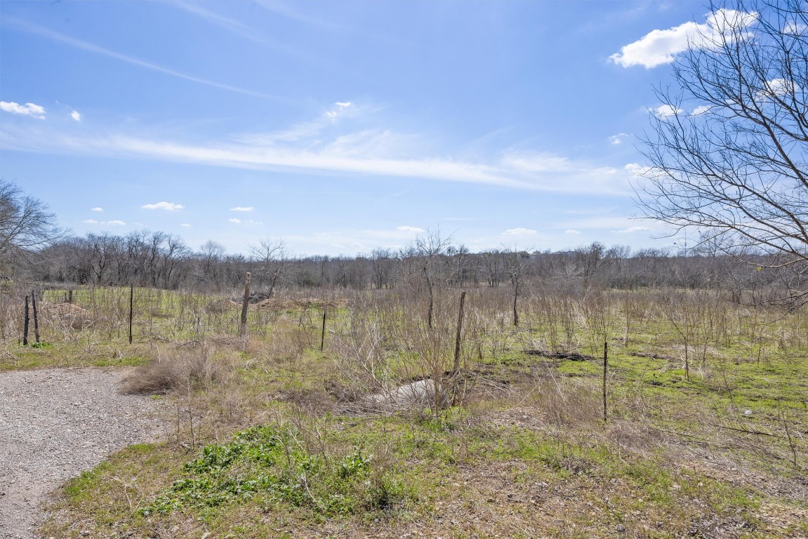 940 Windy Hill Road Kyle, TX 78640 - Photo 11 of 12 a view of lake with mountain
