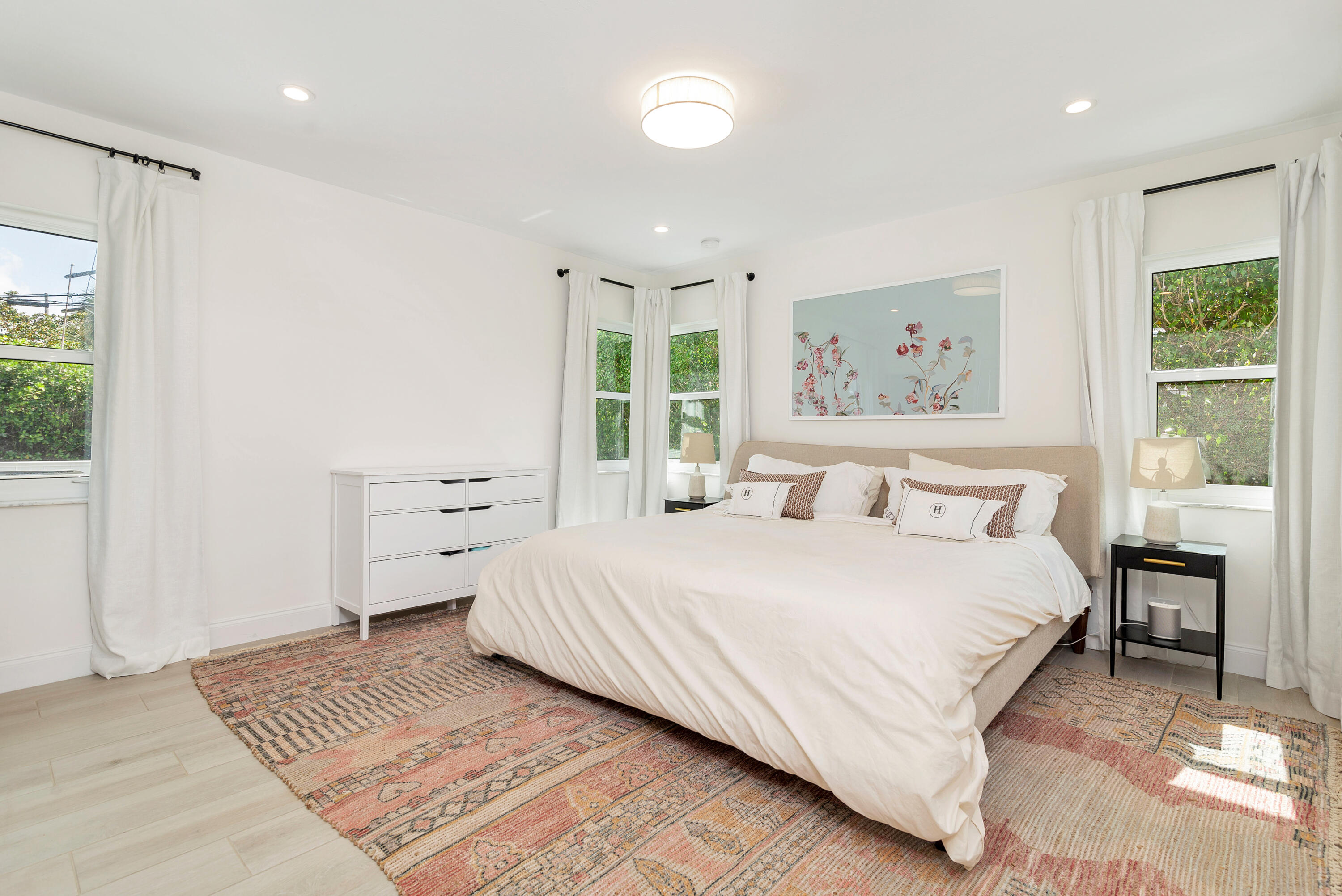 215 Cortez Road West Palm Beach, FL 33405 - Photo 8 of 17 a bedroom with a large bed and a window